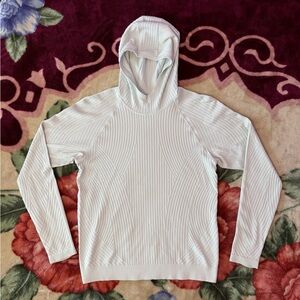 white lululemon rest less hooded pullover.